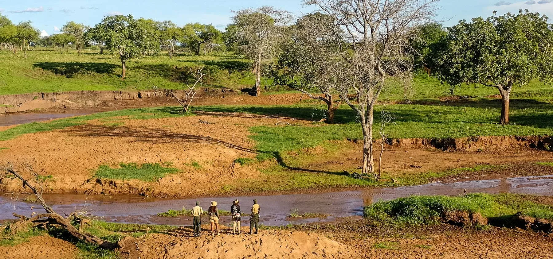 walking safari near river Nandi Adventures 3.jpg | Nandi Adventures Uganda Safari Guests on a walking safari in the Kidepo Valley National Park in Uganda - Nandi Adventures