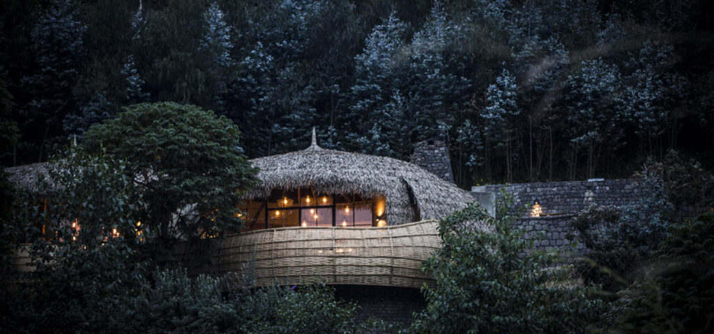 Woven into the jungle is Bisate Lodge near the Volcanoes National Park in Rwanda. This is one of the top luxury lodges for your gorilla trekking safari stay - Nandi Adventures