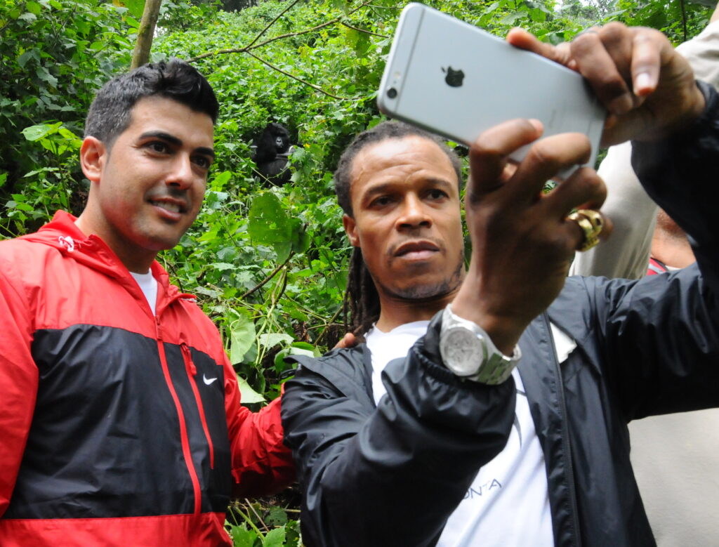 Barcelona legend Davids takes selfie with mountain gorilla in background | Nandi Adventures Uganda Safari Barcelona legend Davids takes selfie with mountain gorilla in background - travel with Nandi Adventures to Uganda